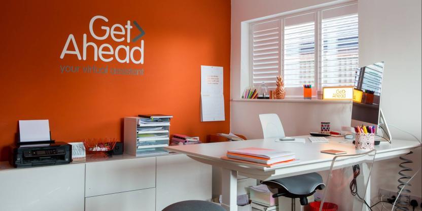 Rebecca Newenham, founder of Get Ahead VA keeps her standing desk tidy