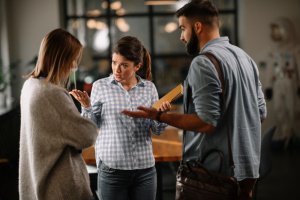 Three co-workers in conflict