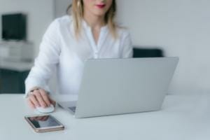 HR Software: Young woman at laptop