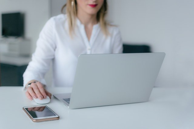 HR Software: Young woman at laptop