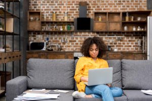 Young woman remote working, but what's the impact on her mental health?
